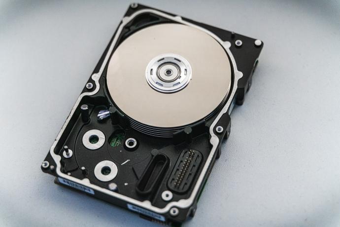 silver and black hard disk drive